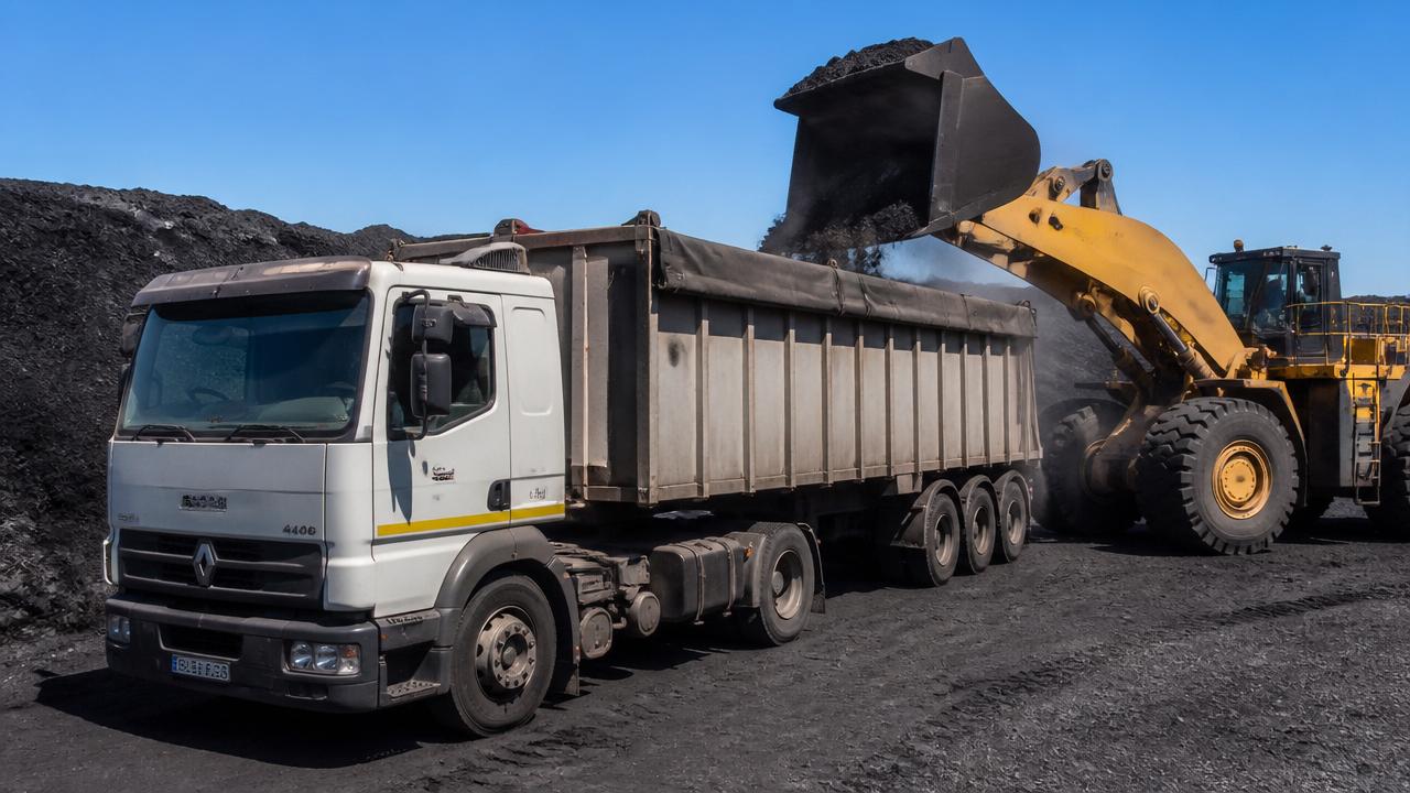 Bulk commodity truck being loaded at a mine site